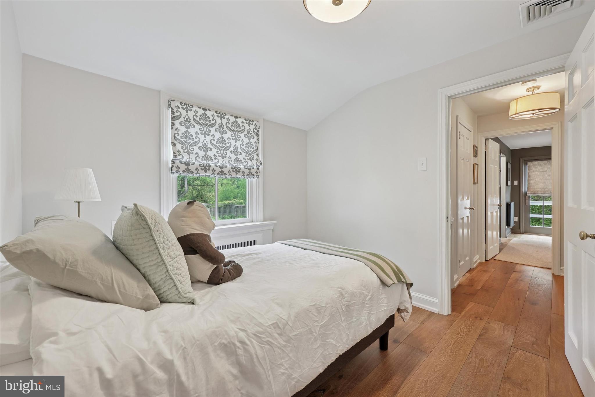 160 Rolling Road Bala Cynwyd, PA 19004 - Photo 13 of 35 a bedroom with a bed and a window