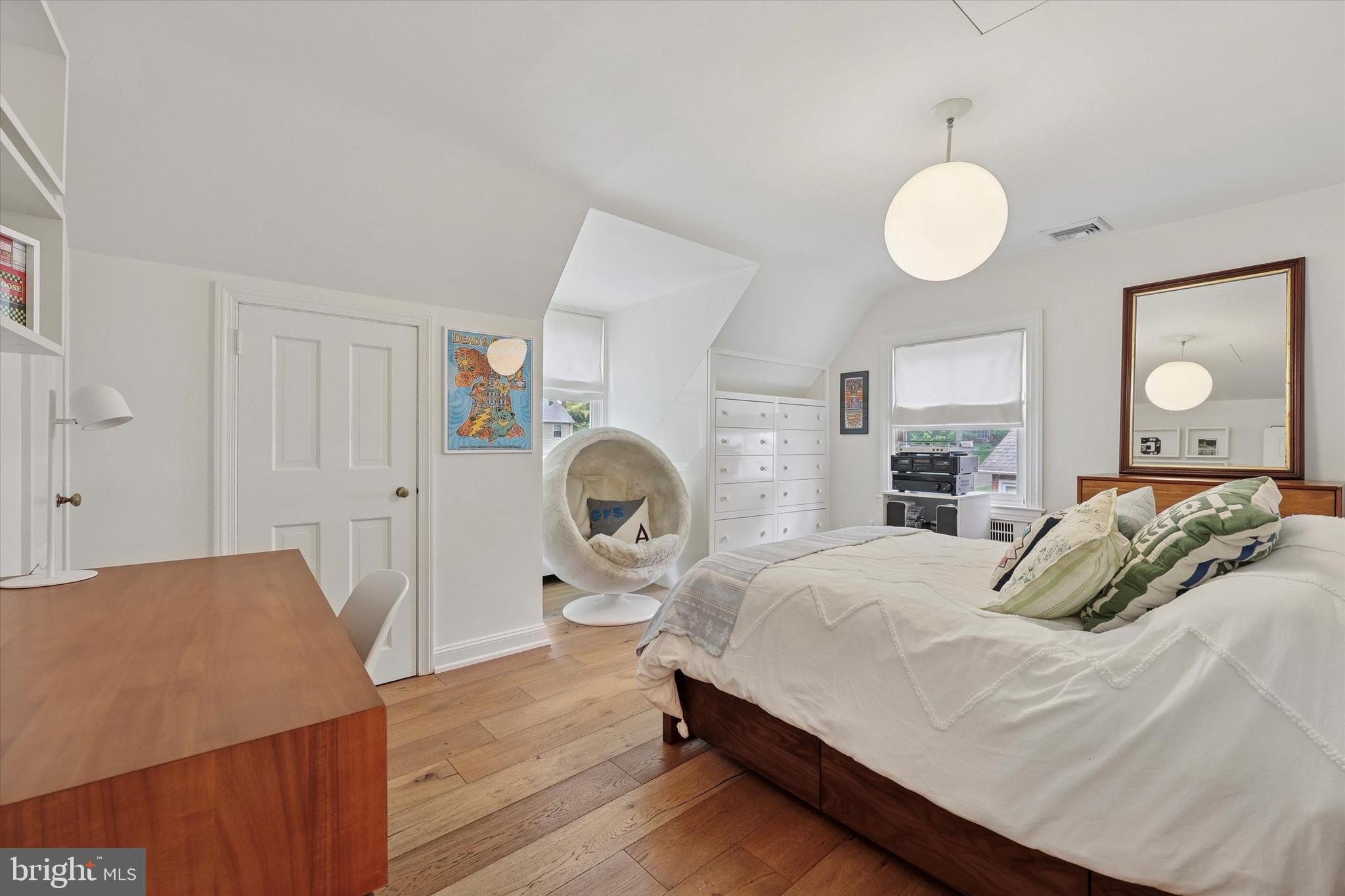 160 Rolling Road Bala Cynwyd, PA 19004 - Photo 14 of 35 a bedroom with a bed and a chandelier