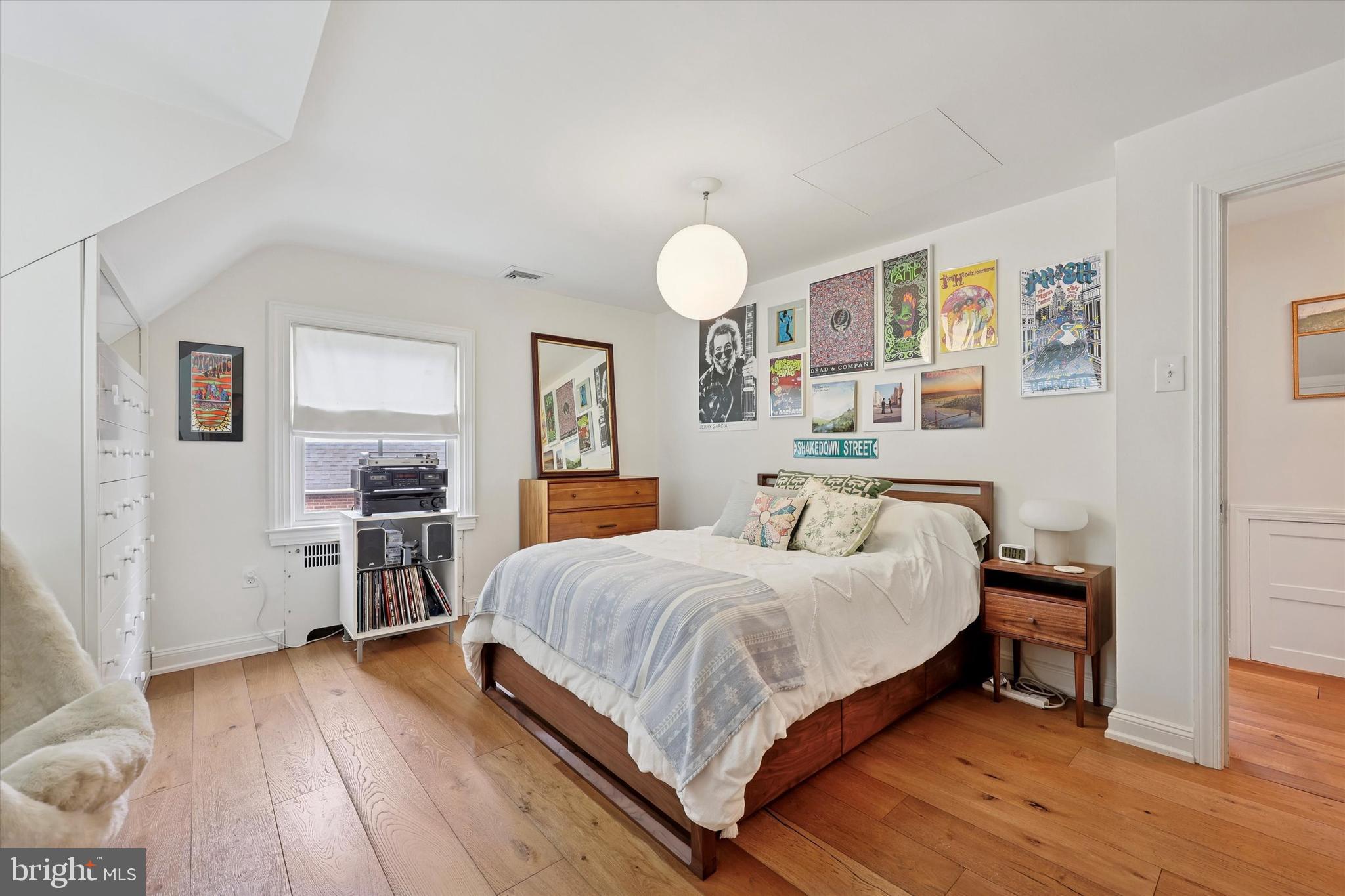 160 Rolling Road Bala Cynwyd, PA 19004 - Photo 15 of 35 a bedroom with a bed and wooden floor