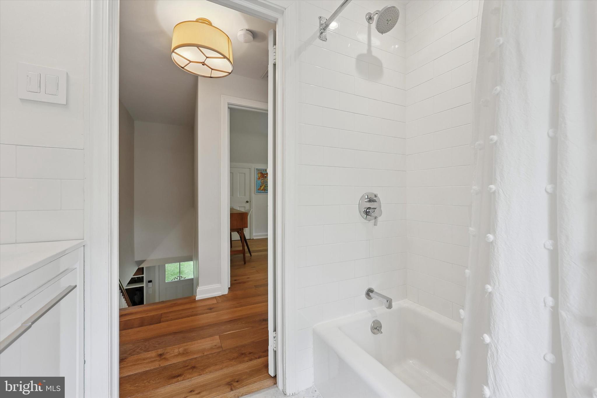 160 Rolling Road Bala Cynwyd, PA 19004 - Photo 18 of 35 a bathroom with a bathtub and a shower