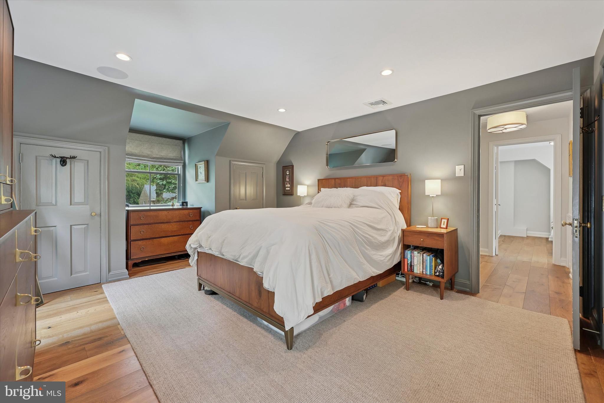 160 Rolling Road Bala Cynwyd, PA 19004 - Photo 22 of 35 a spacious bedroom with a bed and window