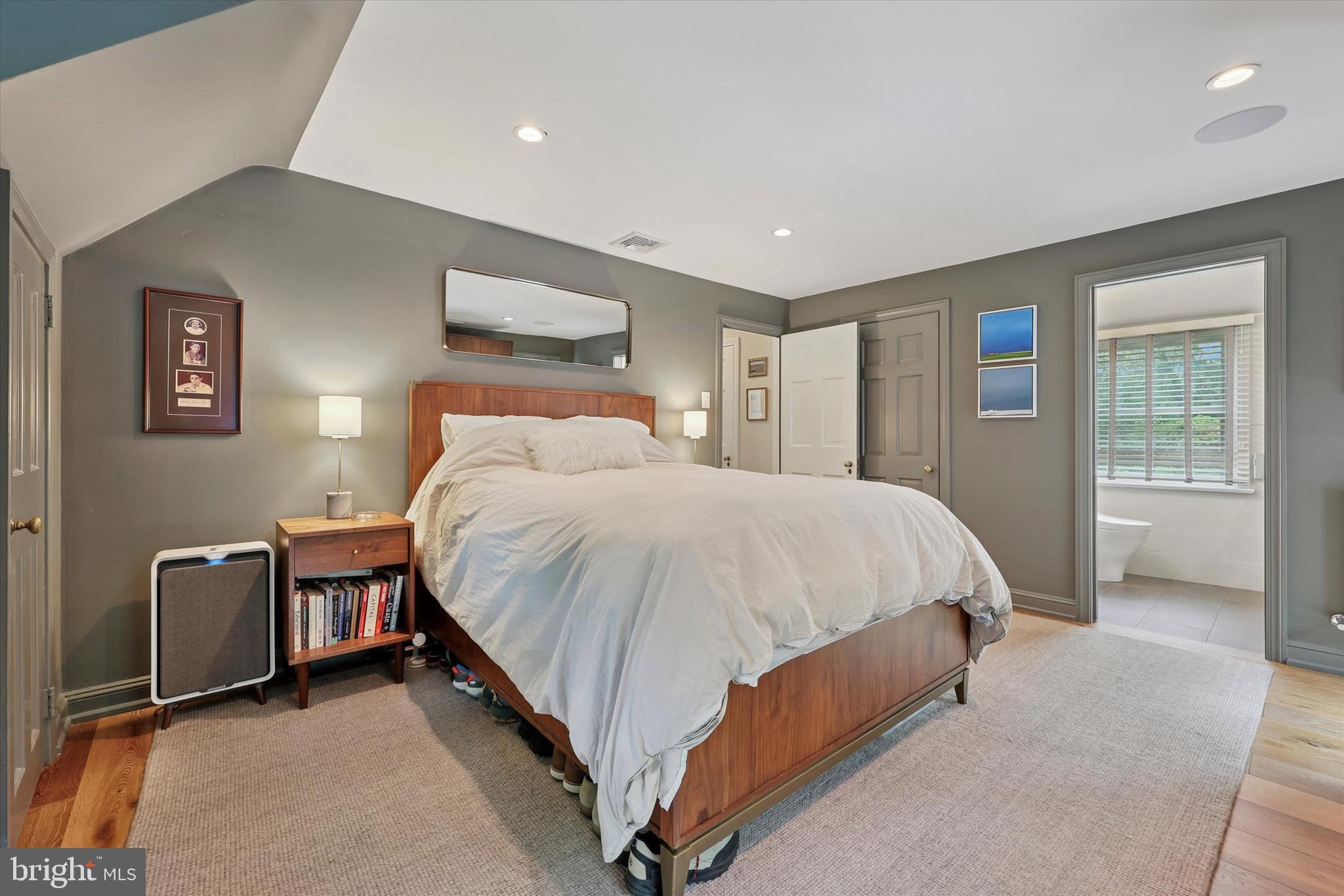 160 Rolling Road Bala Cynwyd, PA 19004 - Photo 24 of 35 a spacious bedroom with a bed and window