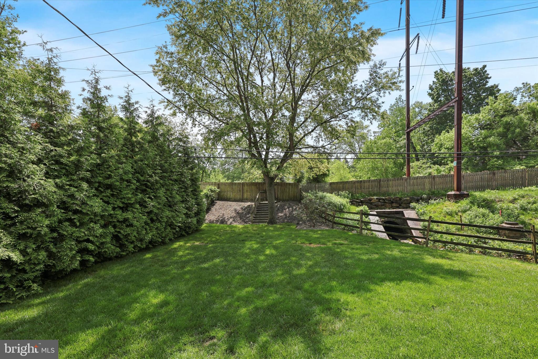 160 Rolling Road Bala Cynwyd, PA 19004 - Photo 31 of 35 a view of a chair and table in the garden