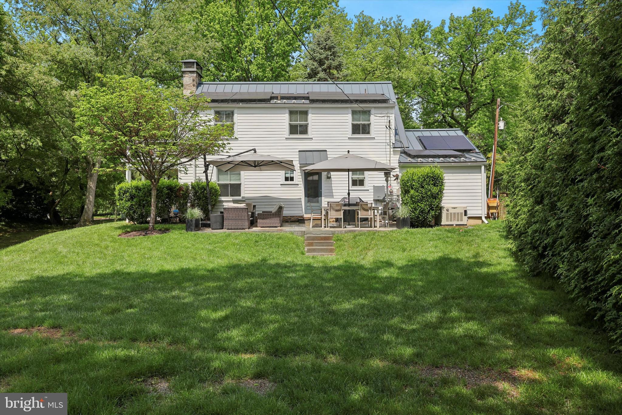 160 Rolling Road Bala Cynwyd, PA 19004 - Photo 32 of 35 a view of a house with a yard and sitting area