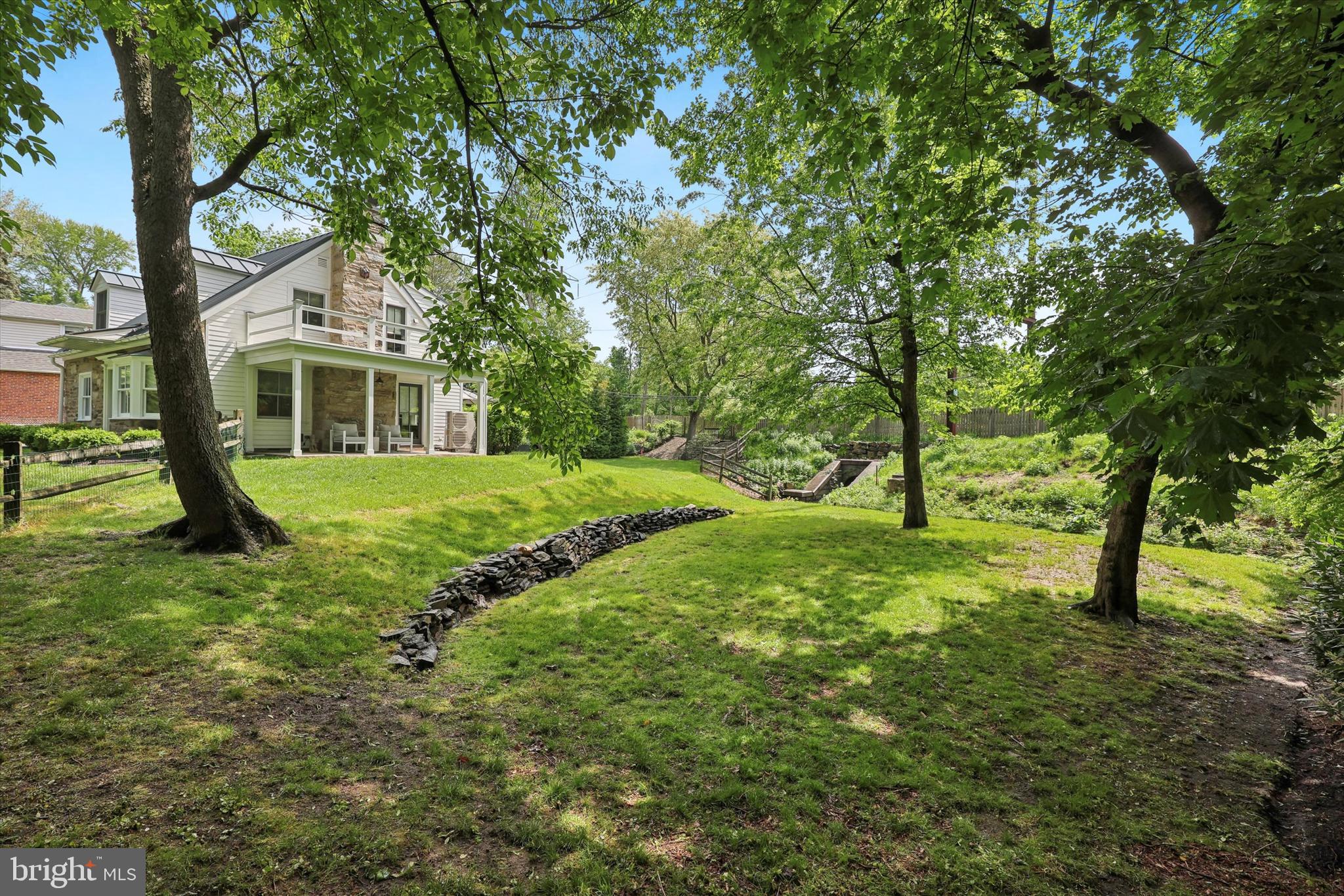 160 Rolling Road Bala Cynwyd, PA 19004 - Photo 34 of 35 a view of a house with a tree in a yard