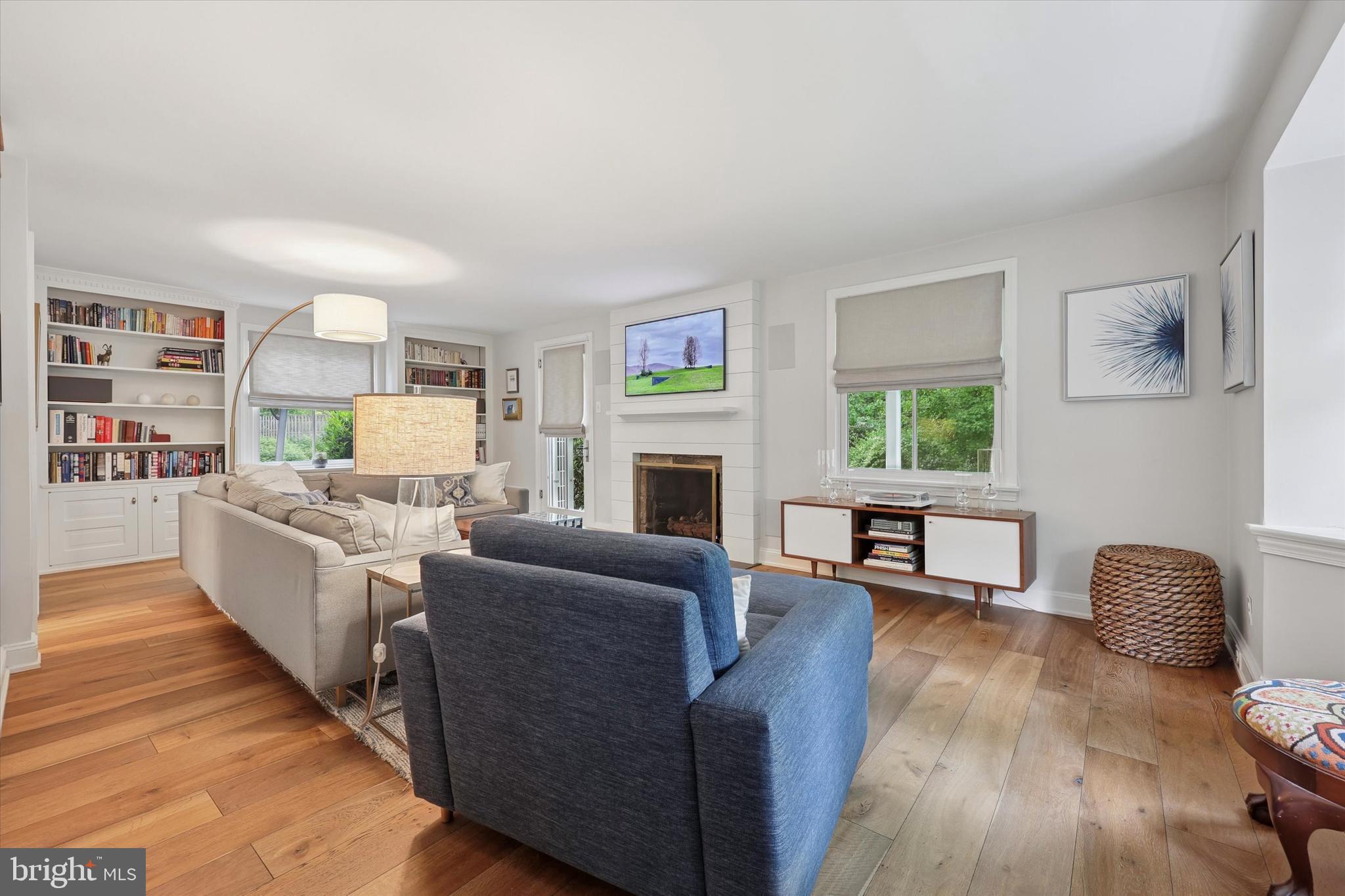 160 Rolling Road Bala Cynwyd, PA 19004 - Photo 4 of 35 a living room with furniture and a fireplace