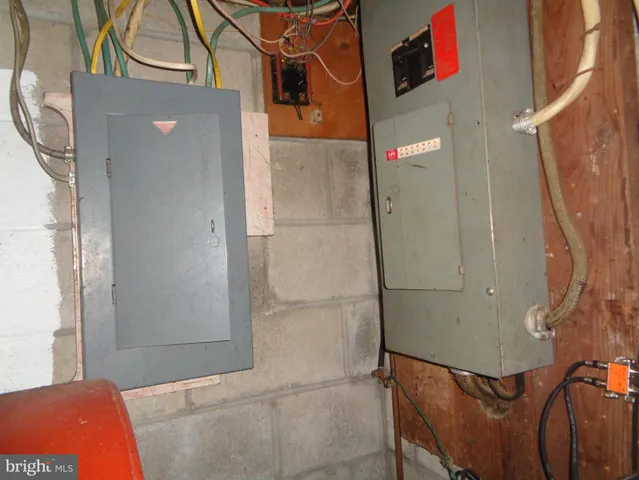 a bathroom with a shower and a sink