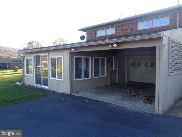 a view of a house with a garden