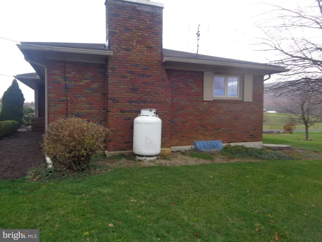 a house view with a garden space
