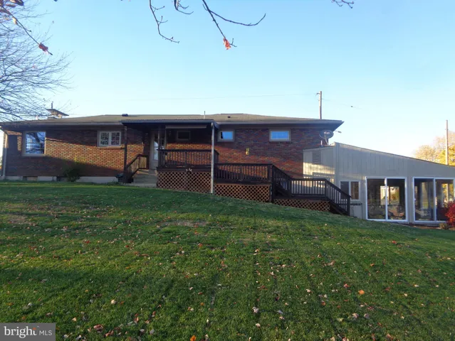 a house view with a garden space