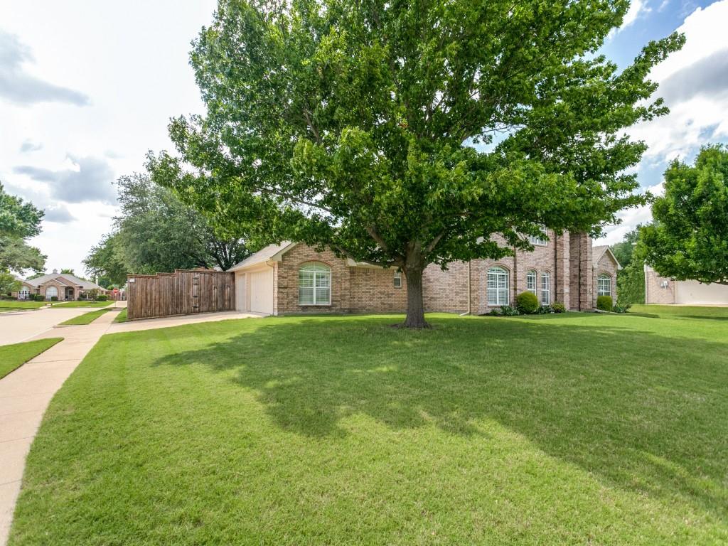601 Mustang Ridge Drive Murphy, TX 75094 - Photo 2 of 30 Big beautiful front yard on a corner lot!