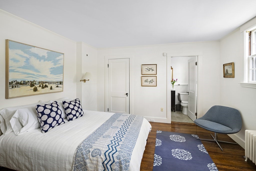 112 Bailey Road Watertown, MA 02472 - Photo 17 of 34 a bedroom with a bed and dresser