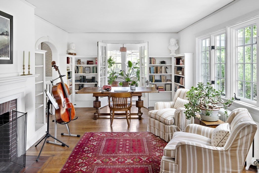 112 Bailey Road Watertown, MA 02472 - Photo 4 of 34 a living room with furniture a rug and a large window