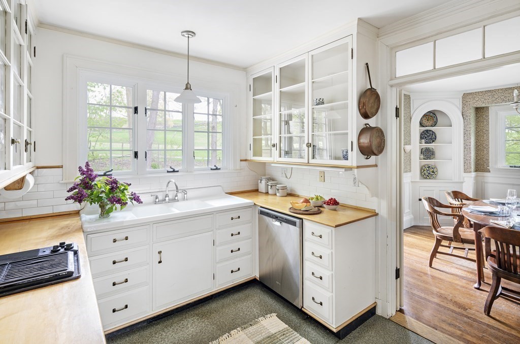 112 Bailey Road Watertown, MA 02472 - Photo 10 of 34 a kitchen with a cabinets and window