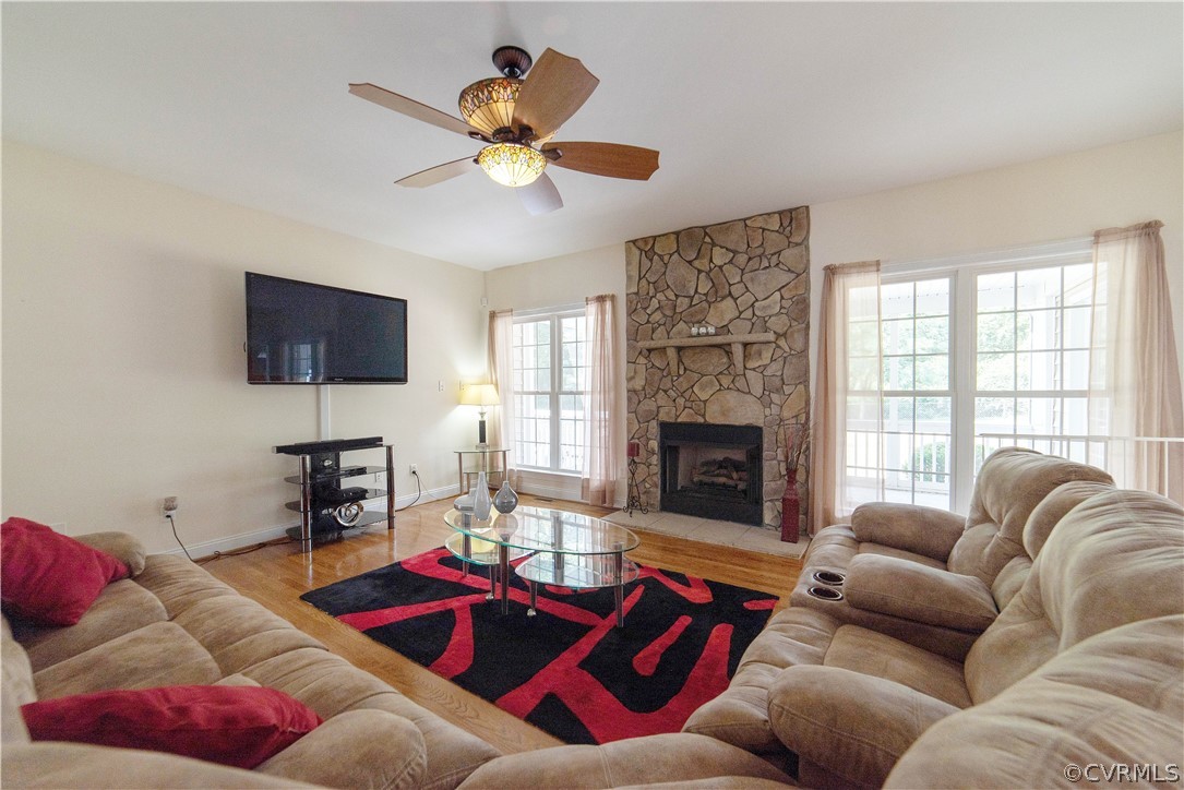 811 Jordan Point Road Hopewell, VA 23860 - Photo 20 of 50 family room with stone fireplace