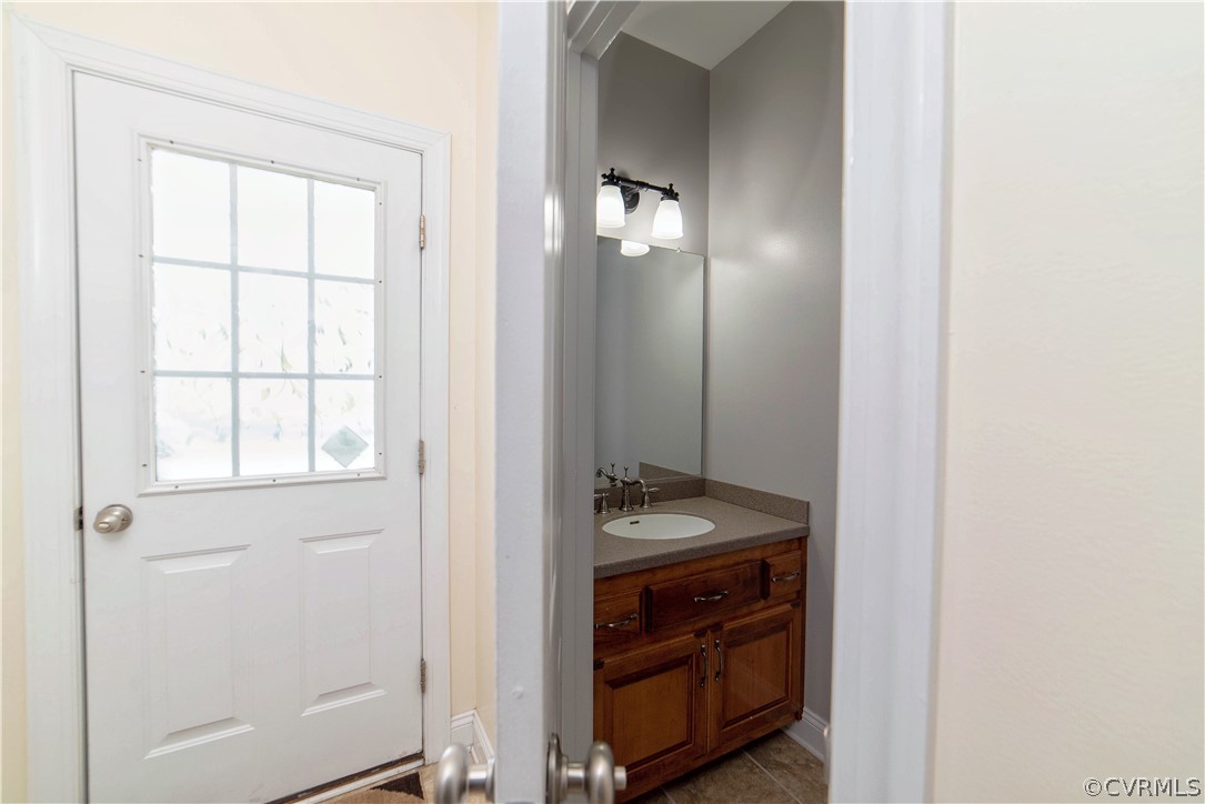 811 Jordan Point Road Hopewell, VA 23860 - Photo 36 of 50 half bath and side entry on first level