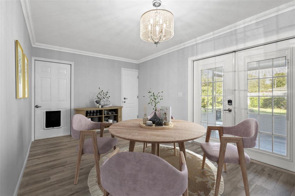 2033 Little Neck Road Clearwater, FL 33755 - Photo 6 of 39 Virtually staged dining area with natural light pouring in from french doors