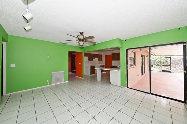 9774 Richmond Circle Boca Raton, FL 33434 - Photo 14 of 14 a view of a kitchen with microwave and refrigerator