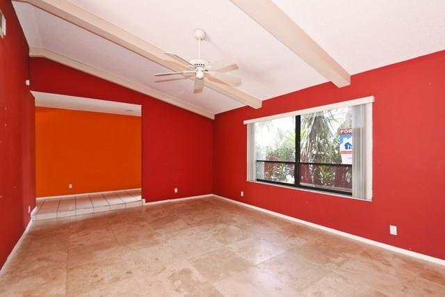 9774 Richmond Circle Boca Raton, FL 33434 - Photo 3 of 14 an empty room with windows and fan