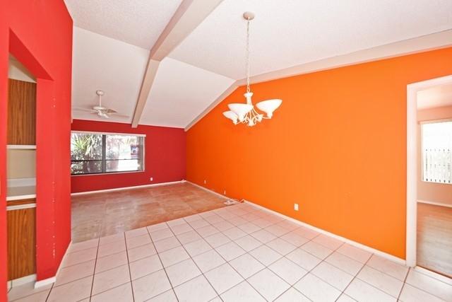 9774 Richmond Circle Boca Raton, FL 33434 - Photo 6 of 14 a view of an empty room and window