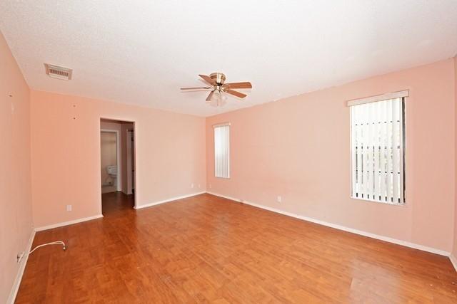 9774 Richmond Circle Boca Raton, FL 33434 - Photo 7 of 14 an empty room with windows and closet