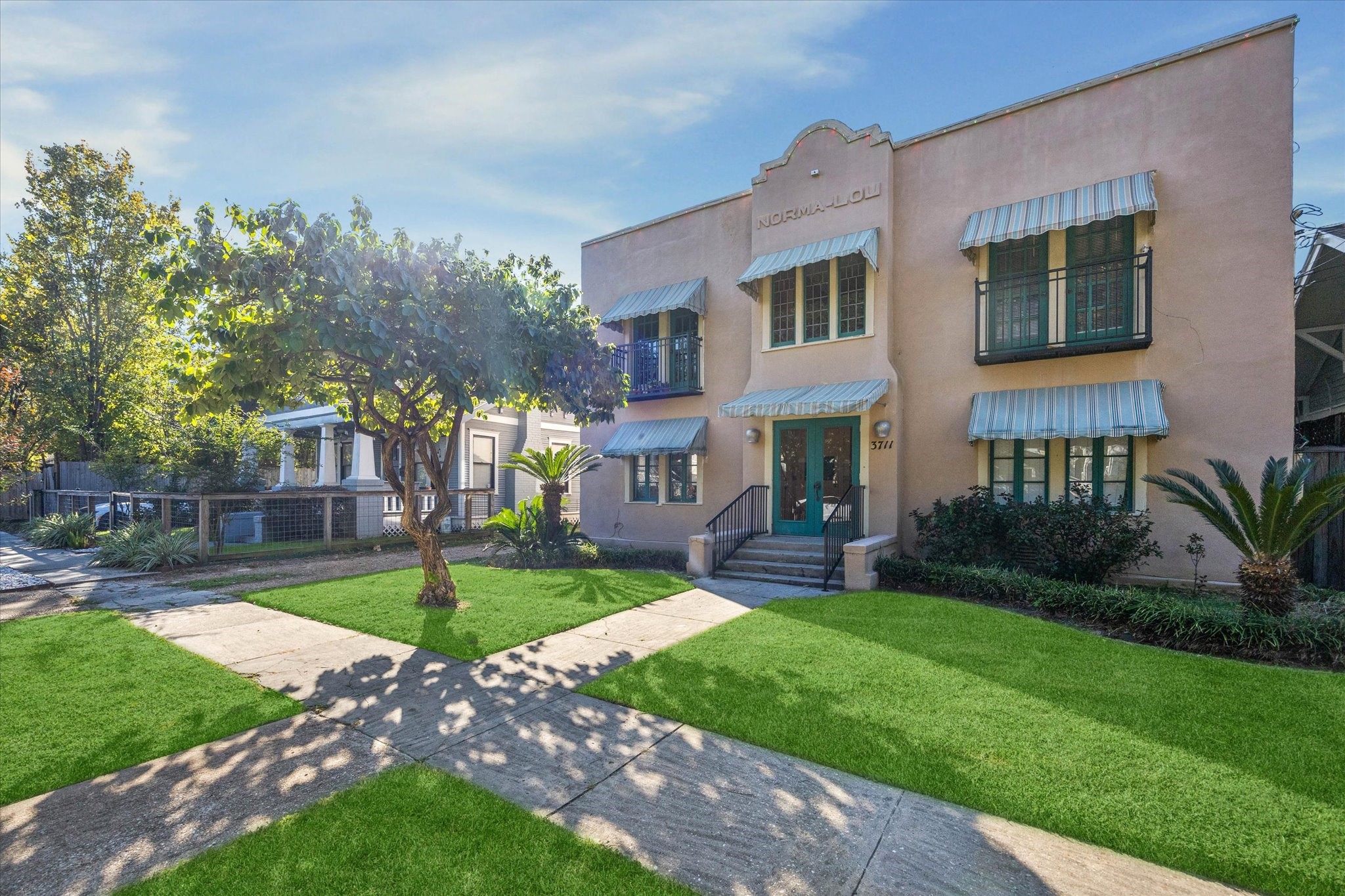 3711 Reagan Street Houston, TX 77009 - Photo 3 of 40 a front view of a house with garden