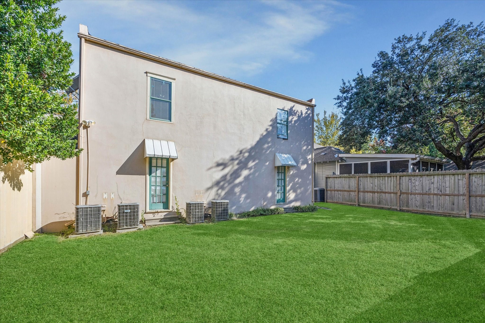 3711 Reagan Street Houston, TX 77009 - Photo 33 of 40 a view of a house with a yard and sitting area