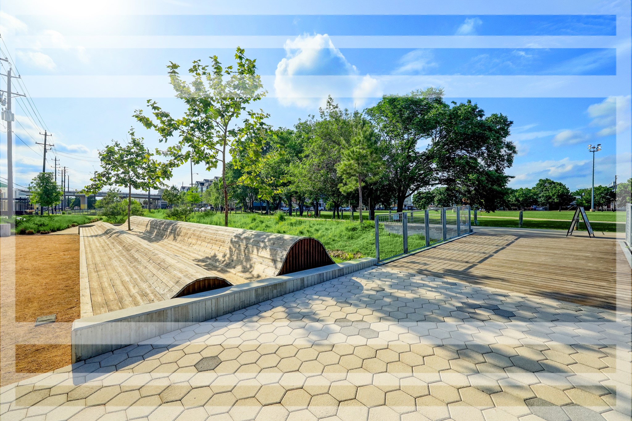 3711 Reagan Street Houston, TX 77009 - Photo 36 of 40 a view of a park with potted plants and a palm tree