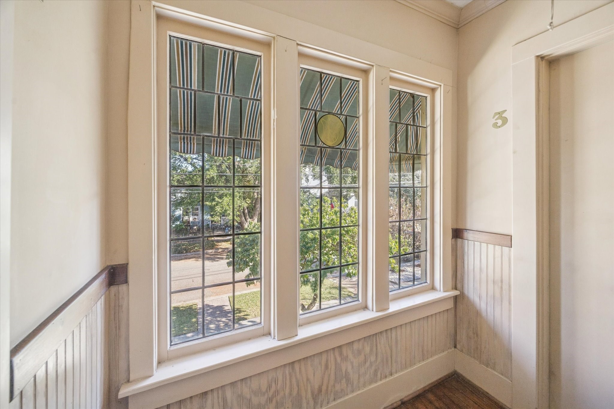 3711 Reagan Street Houston, TX 77009 - Photo 6 of 40 a view of a room that has a large window and front door