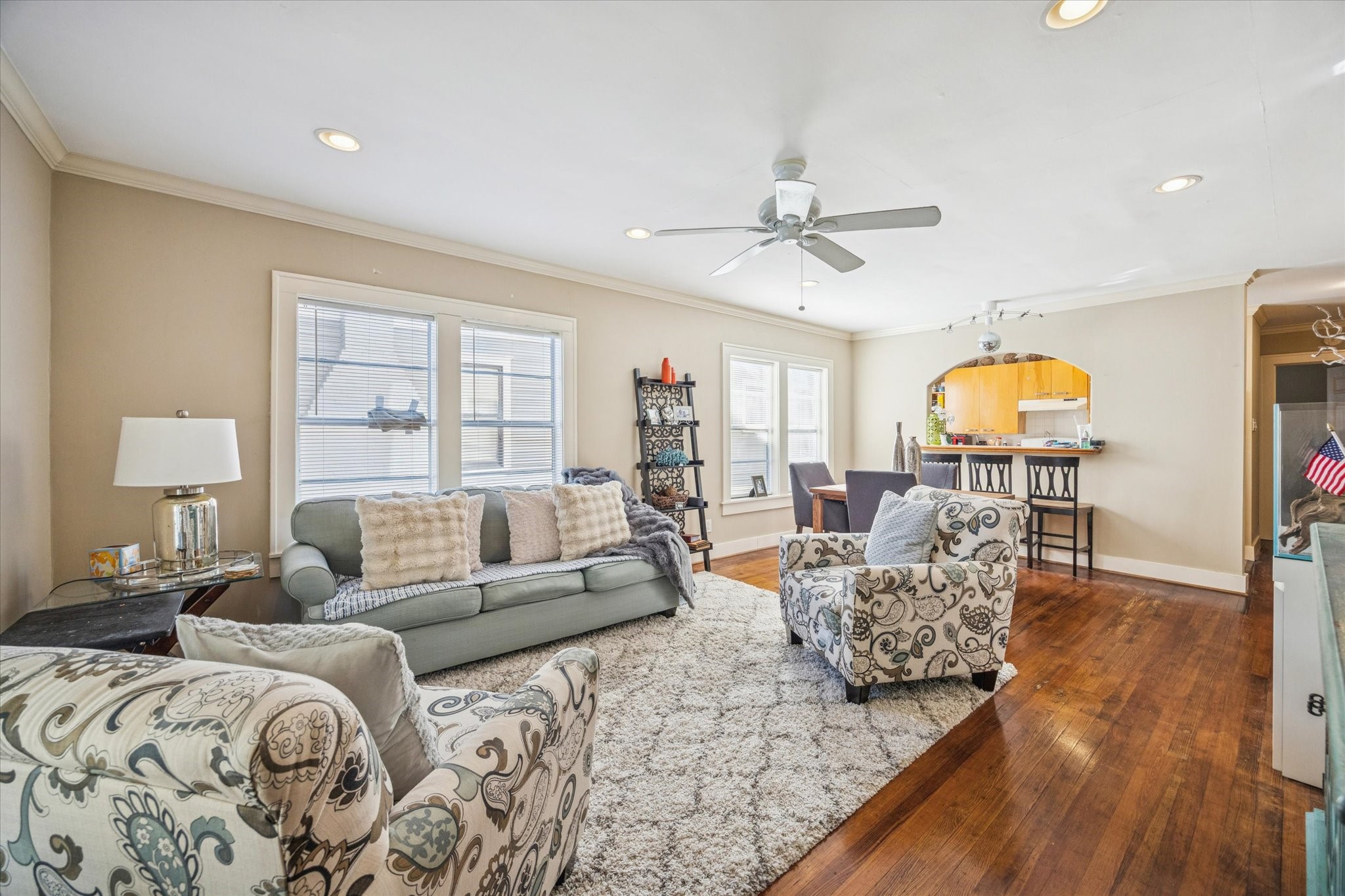 3711 Reagan Street Houston, TX 77009 - Photo 7 of 40 a living room with furniture and a chandelier