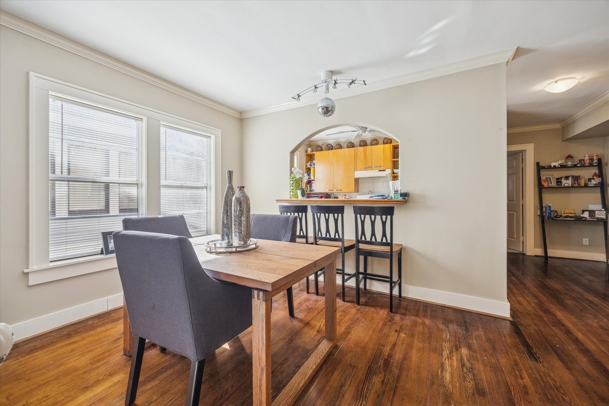 3711 Reagan Street Houston, TX 77009 - Photo 9 of 40 a view of a dining room with furniture window and wooden floor
