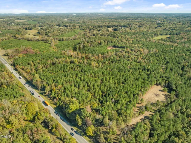a view of a field with an outdoor space