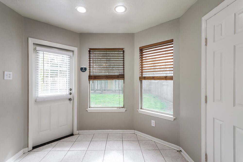 19823 Indian Cherry Forest Lane Cypress, TX 77433 - Photo 6 of 16 an empty room with windows