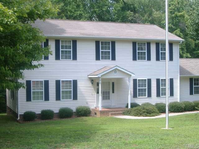 21 Landmark N Road Roxboro, NC 27574 - Photo 1 of 12 a front view of a house with a yard