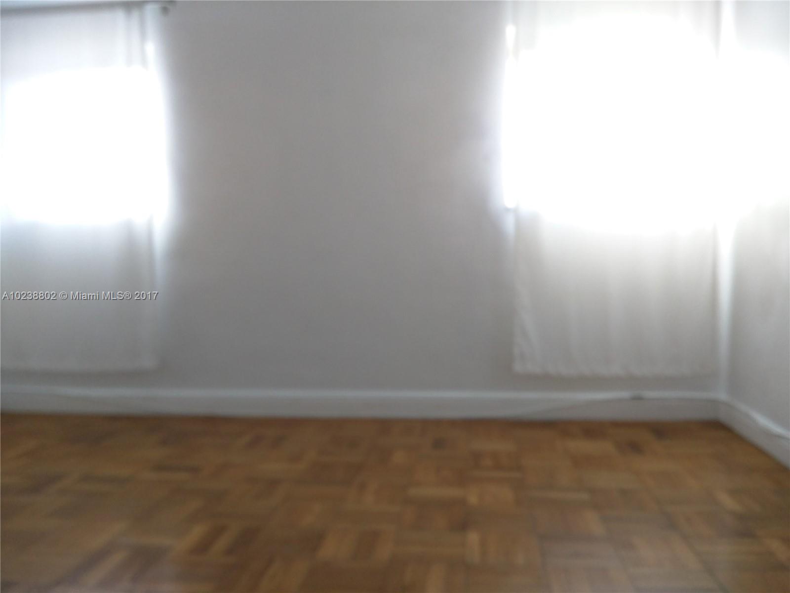 4717 Alton Road Miami Beach, FL 33140 - Photo 14 of 34 a view of room with window