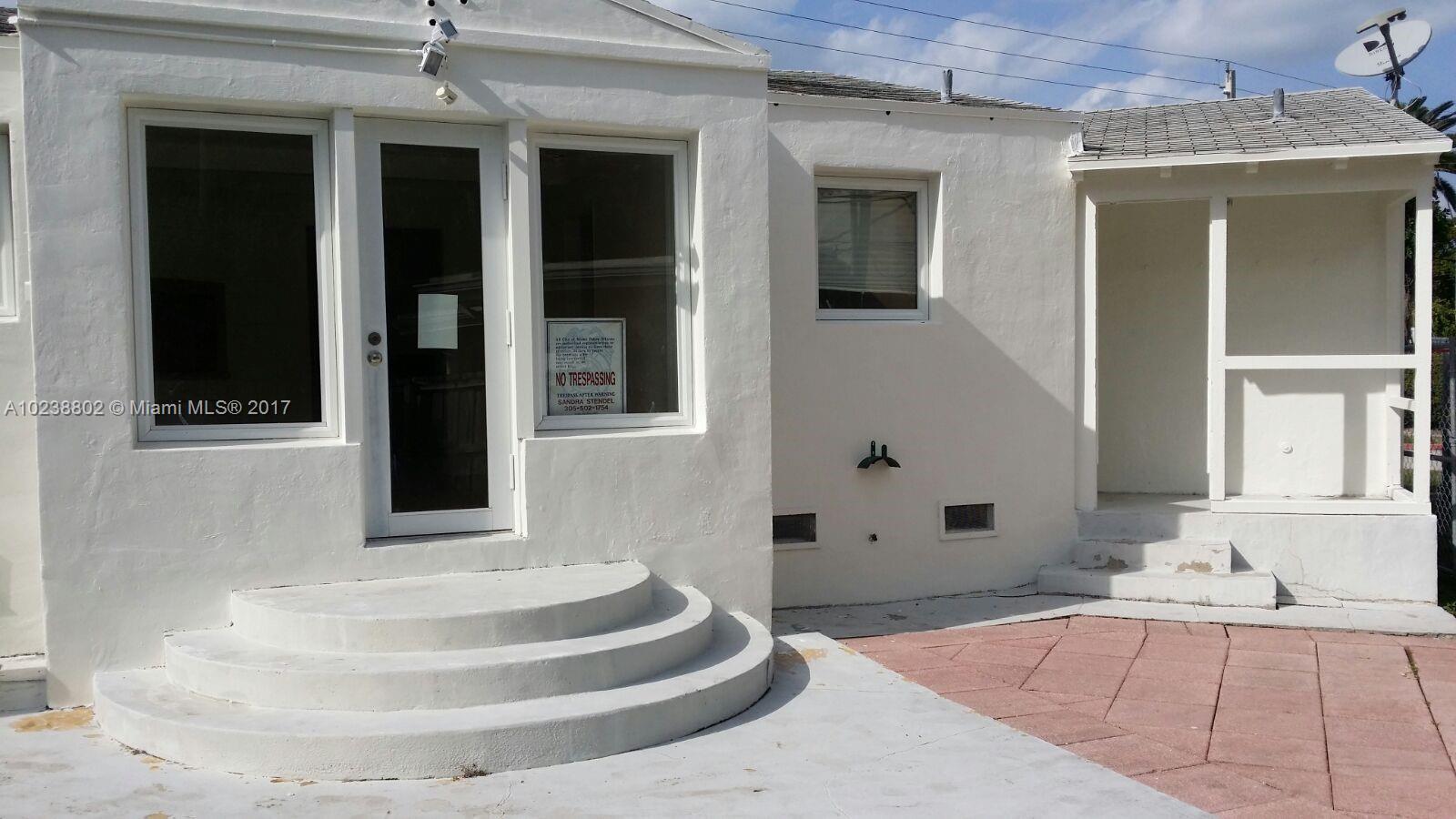 4717 Alton Road Miami Beach, FL 33140 - Photo 26 of 34 front view of a house