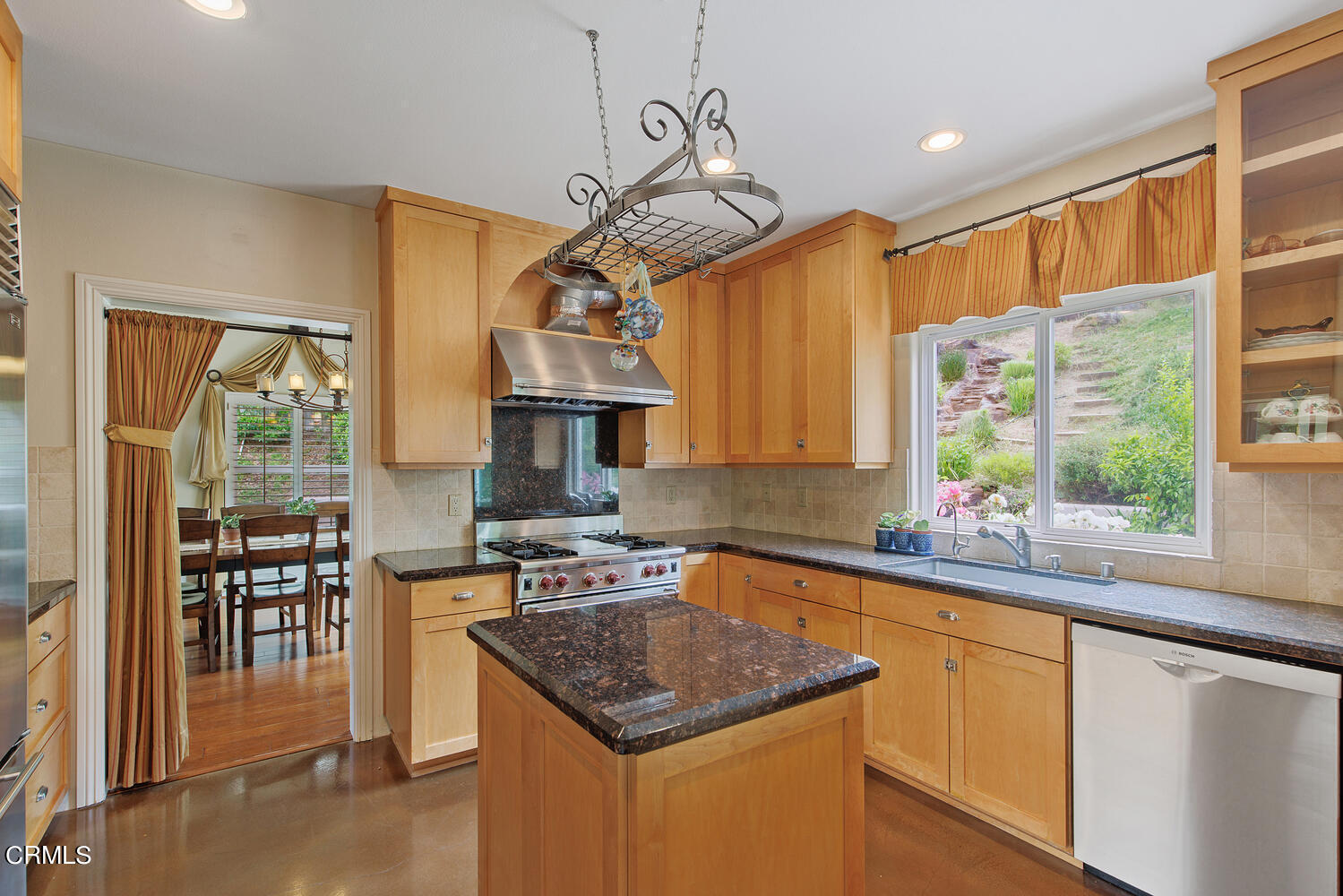 600 Rancho Road Thousand Oaks, CA 91362 - Photo 12 of 47 a kitchen with stainless steel appliances granite countertop a sink a stove and a refrigerator