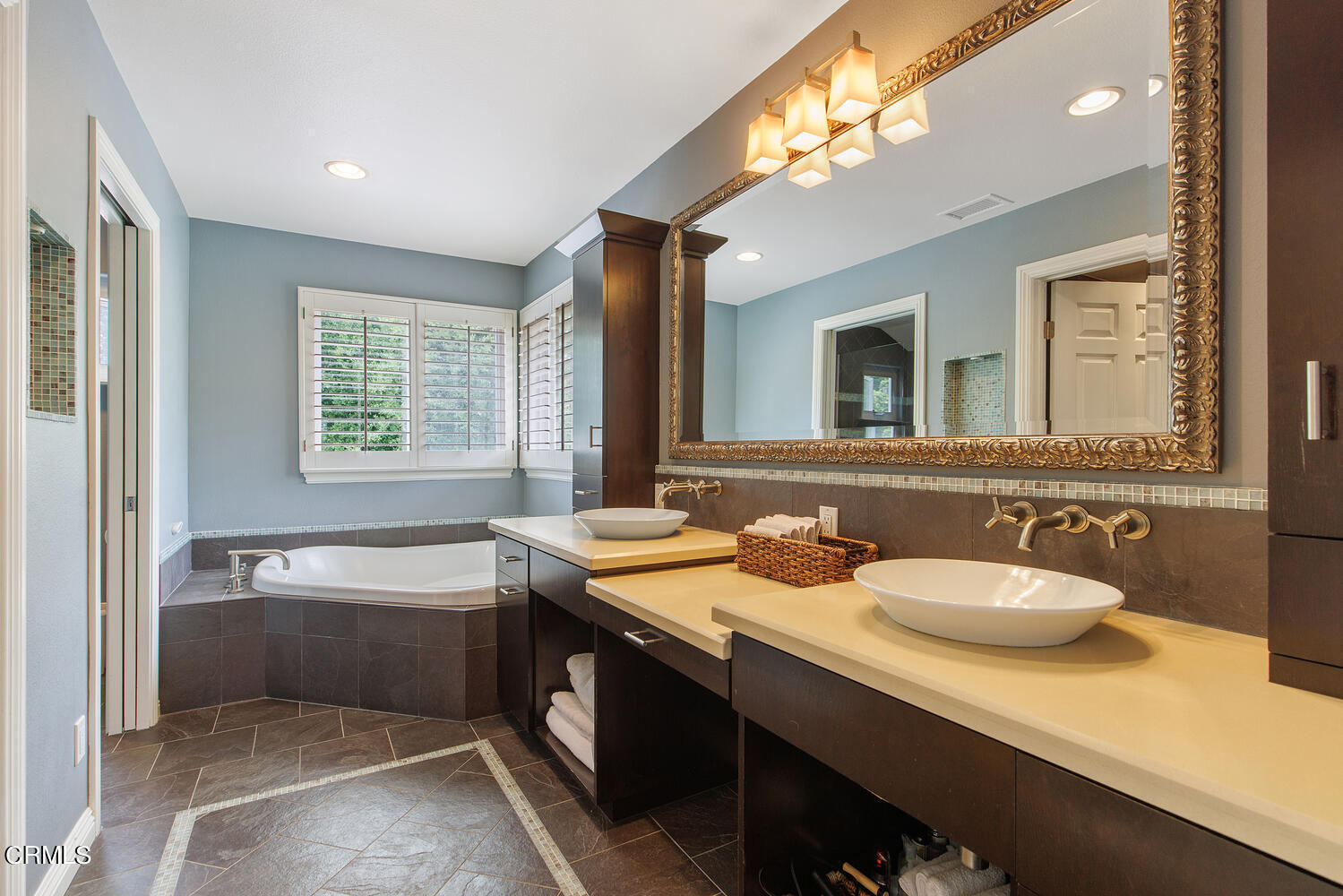 600 Rancho Road Thousand Oaks, CA 91362 - Photo 25 of 47 a bathroom with a granite countertop sink mirror and a bathtub
