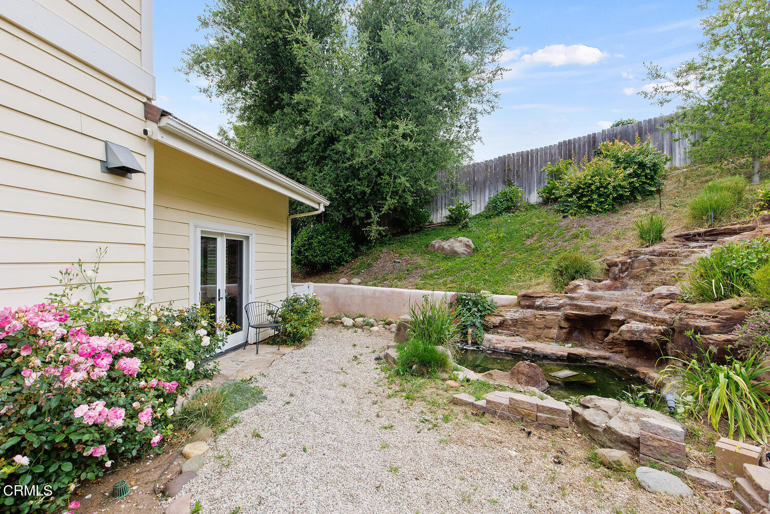 600 Rancho Road Thousand Oaks, CA 91362 - Photo 33 of 47 a view of a house with a backyard and garden