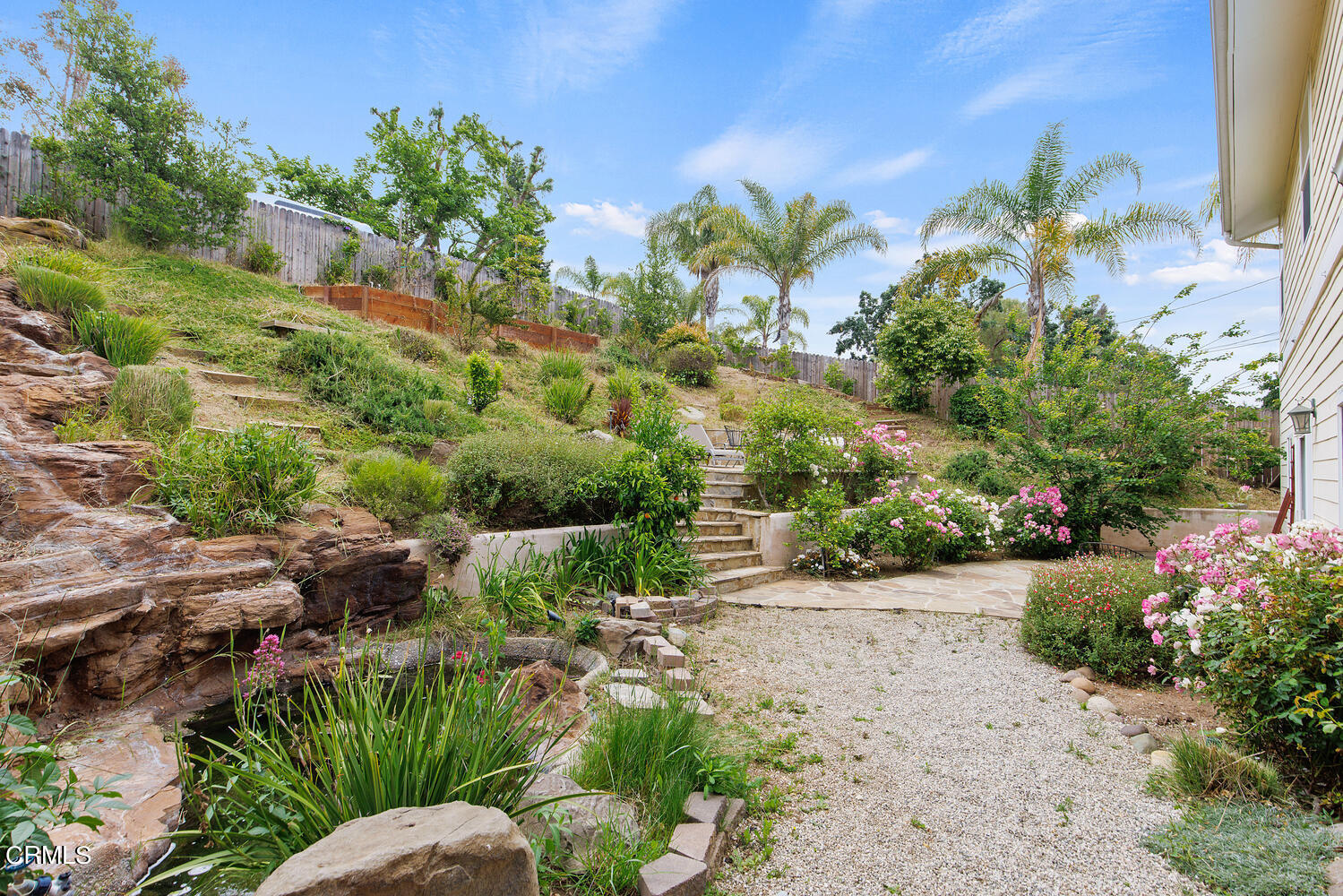 600 Rancho Road Thousand Oaks, CA 91362 - Photo 35 of 47 a backyard of a house with a yard and outdoor seating
