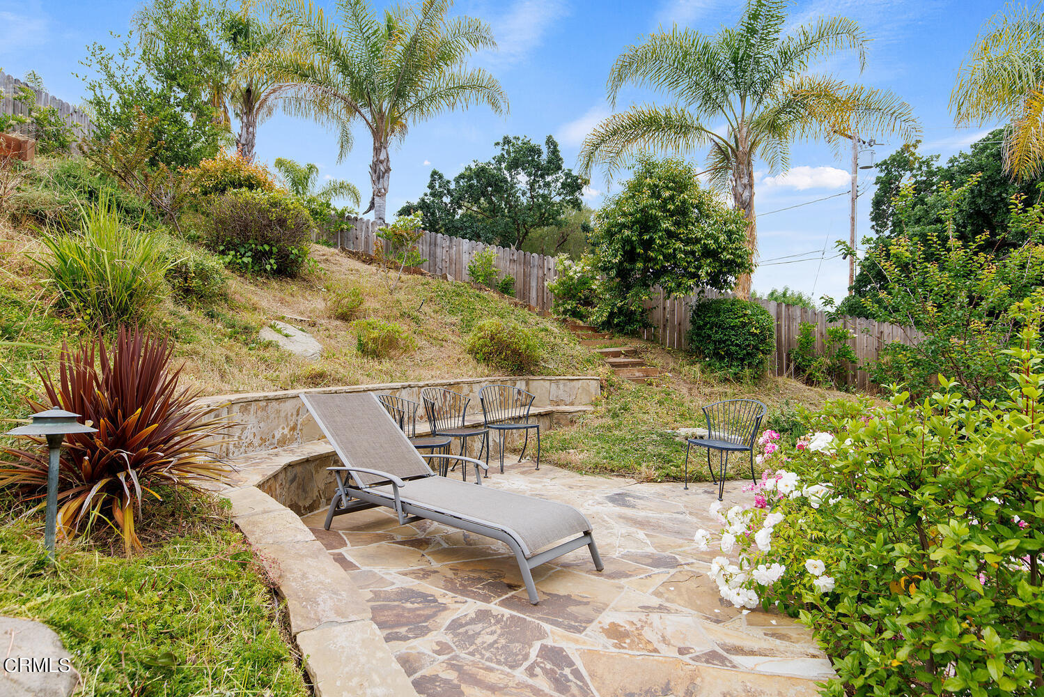 600 Rancho Road Thousand Oaks, CA 91362 - Photo 36 of 47 a view of a swimming pool with a patio and a garden