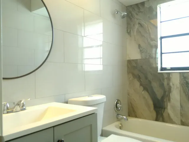a bathroom with a sink and a bathtub