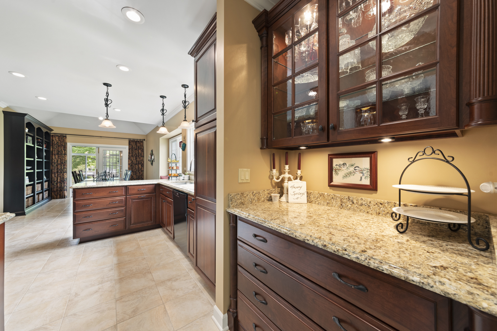 20 Lake Ridge Club Court Burr Ridge, IL 60527 - Photo 12 of 43 a large kitchen with stainless steel appliances granite countertop a sink and cabinets