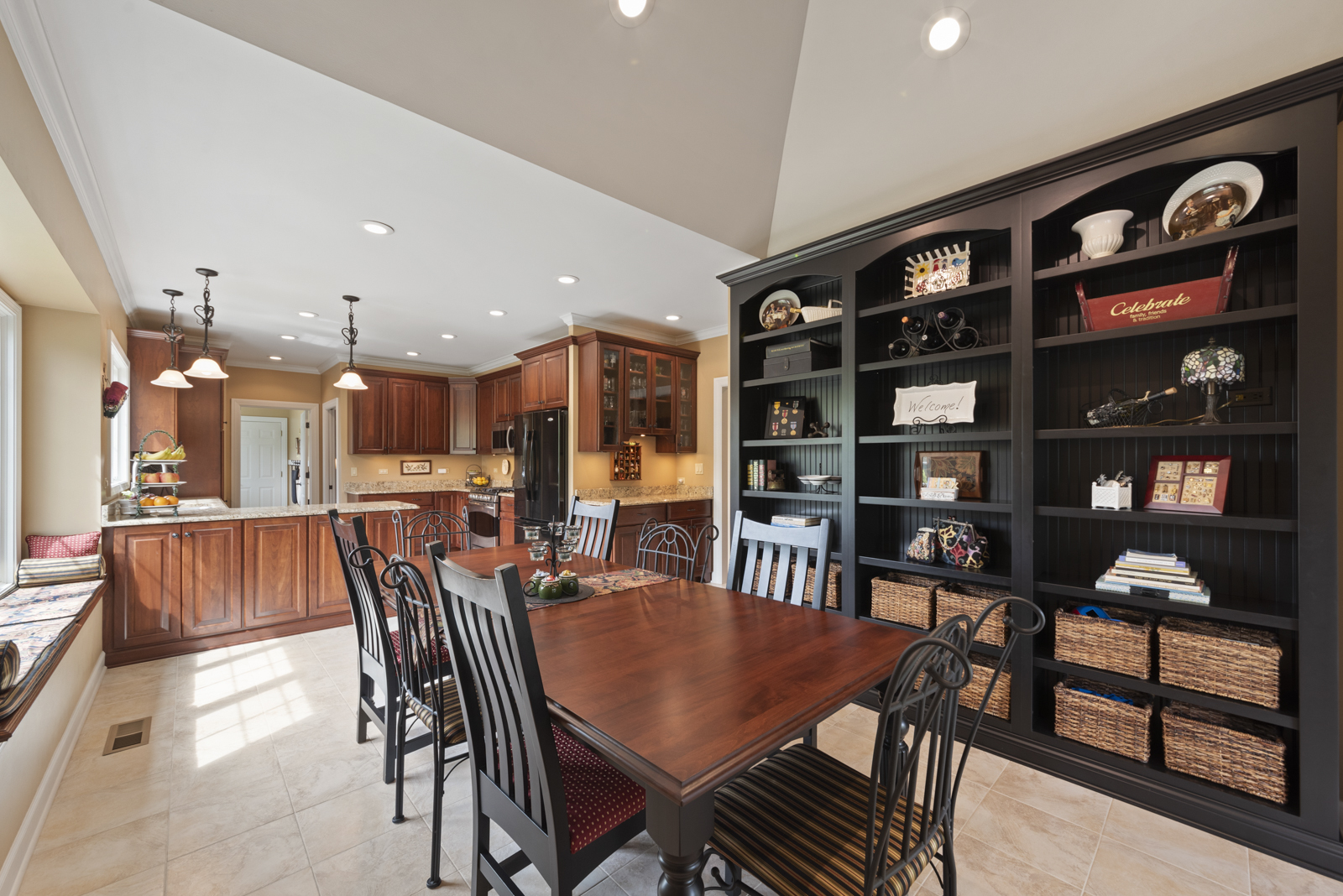 20 Lake Ridge Club Court Burr Ridge, IL 60527 - Photo 13 of 43 a dining room with furniture a rug and a book shelf