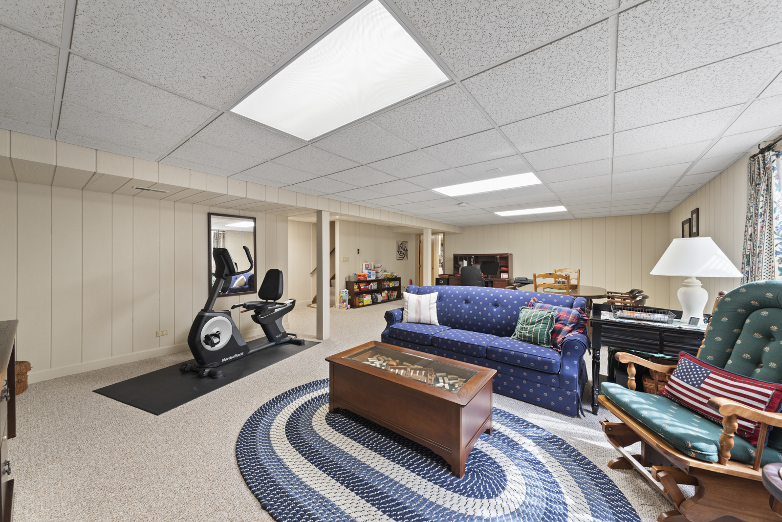 20 Lake Ridge Club Court Burr Ridge, IL 60527 - Photo 26 of 43 a living room with furniture a couch and a chandelier