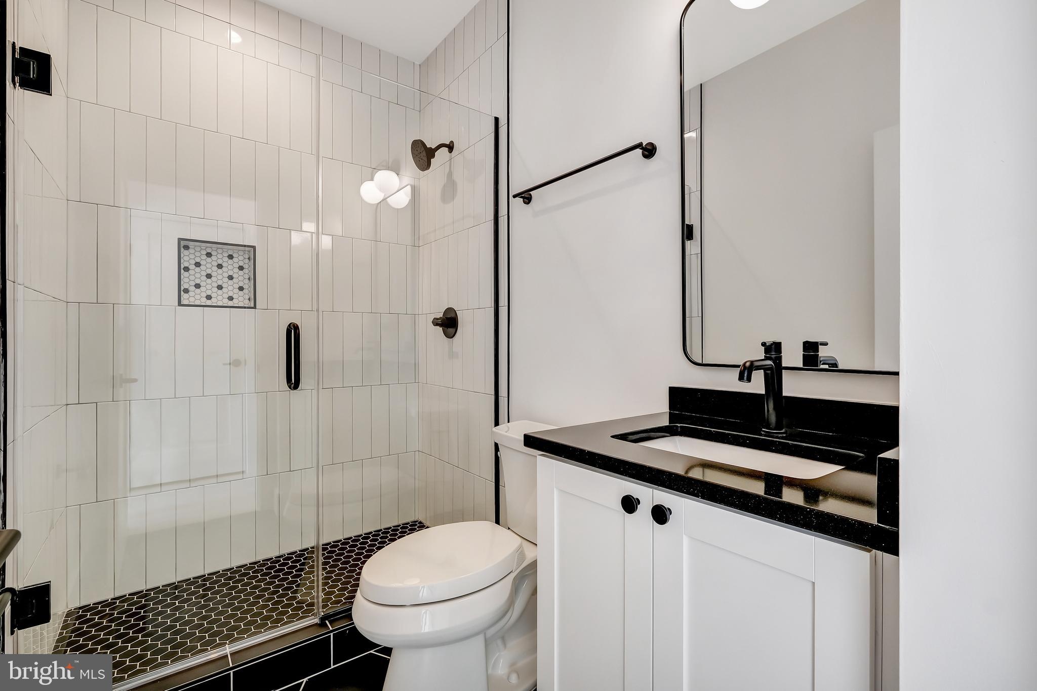 2121 3rd Street Northeast, Unit 2 Washington, DC 20002 - Photo 12 of 24 Main level full bath