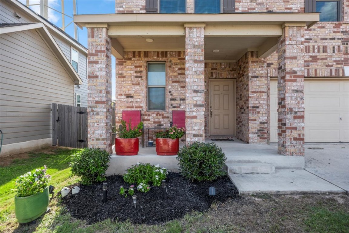 239 Crimson Lane Kyle, TX 78640 - Photo 2 of 25 a view of a bunch of flowers