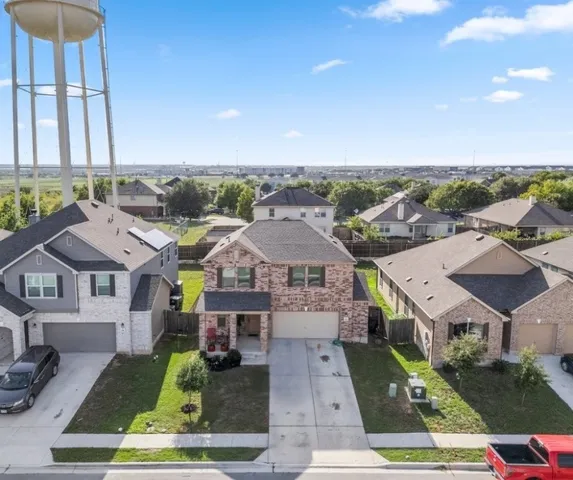 a aerial view of a town with many houses