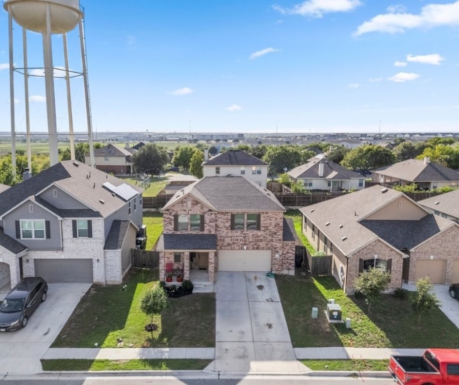 239 Crimson Lane Kyle, TX 78640 - Photo 3 of 25 a aerial view of a town with many houses