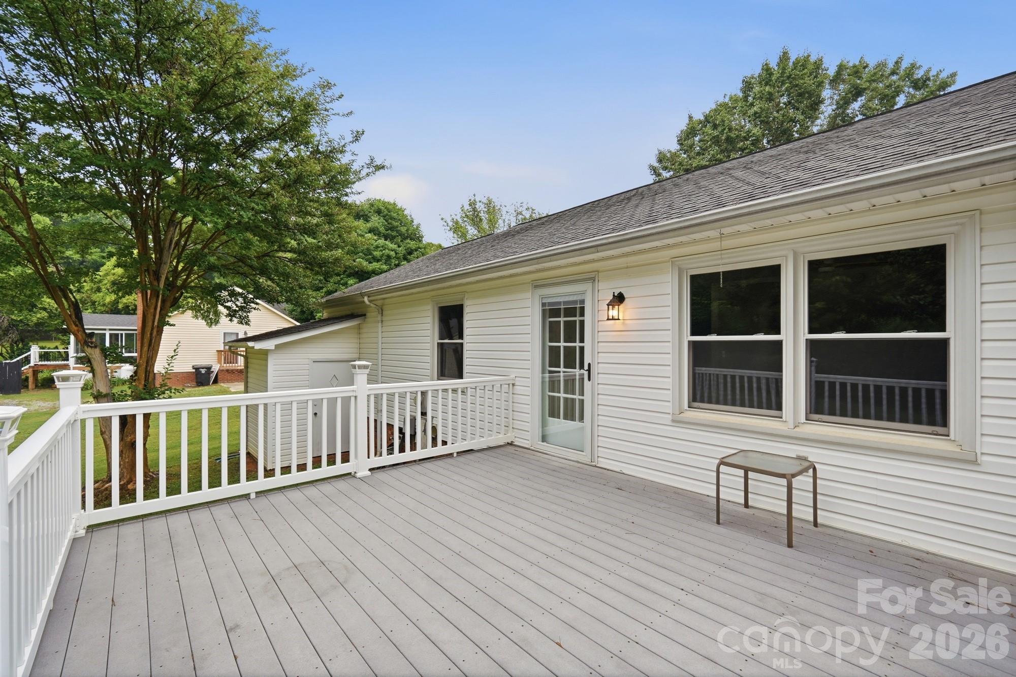 1235 Winecoff School Road Concord, NC 28027 - Photo 22 of 27 a view of a house with wooden deck